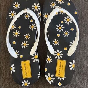 Kate Spade Malta Black Flip Flops with Daisy Floral Design